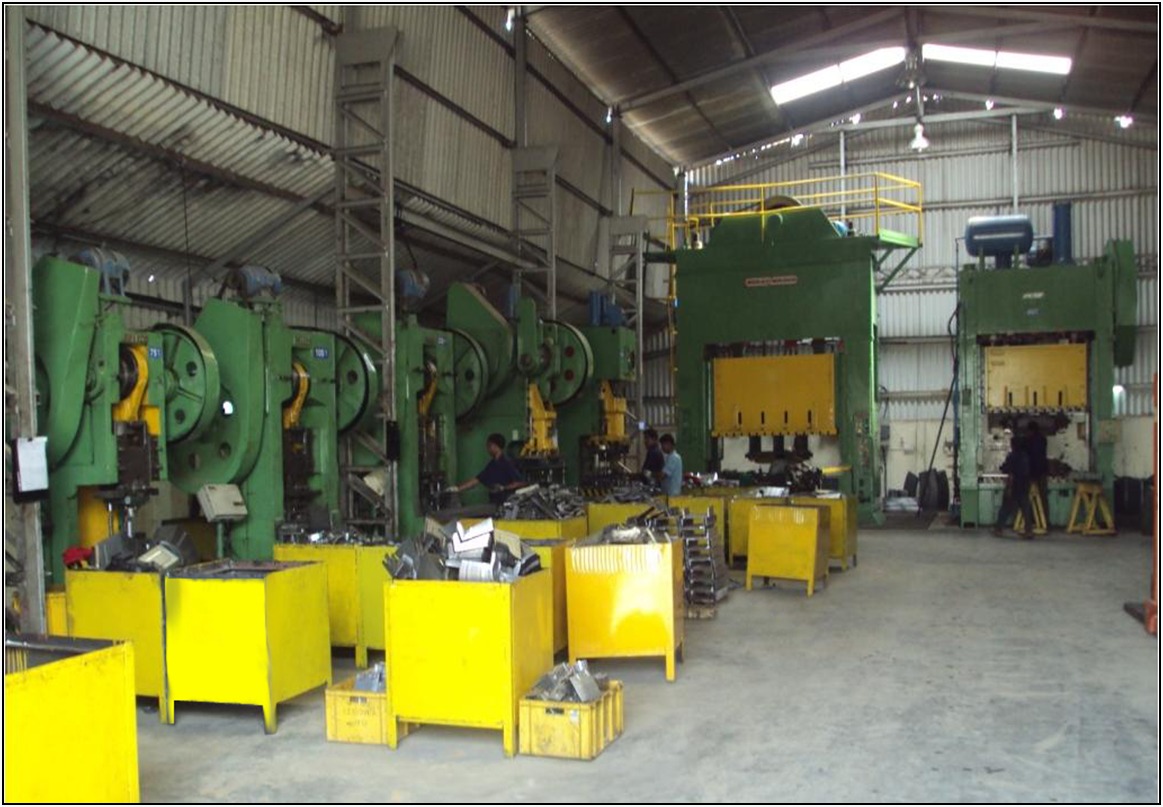 An industrial grinding machine meticulously finishing a metal workpiece, ensuring exceptional surface quality and tight tolerances for precision tools and components